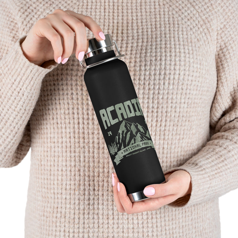 Stainless steel water bottle featuring an Acadia National Park design with a mountain illustration and "Est. 1916" text, durable powder-coated finish.