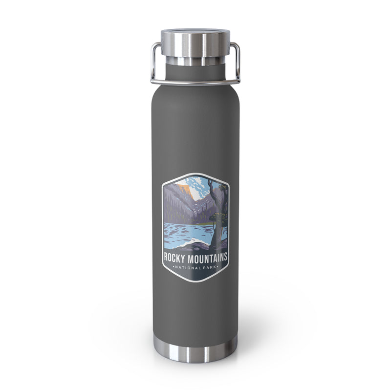 Grey stainless steel water bottle featuring a design of Rocky Mountains National Park with mountain and lake scenery.