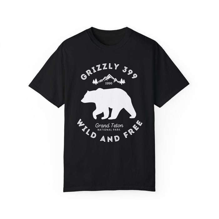 Grand Teton National Park T-shirt featuring a graphic design with Grizzly 399, mountains, and "Wild and Free" text.