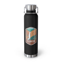 Black stainless steel water bottle featuring a design of Yellowstone National Park with a waterfall and canyon scenery.