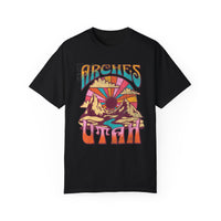 T-shirt featuring a retro scenic design of Arches National Park with a vibrant graphic.