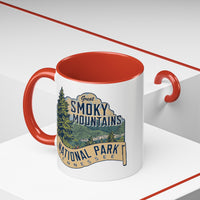 11 oz red ceramic mug featuring an illustration of Great Smoky Mountains National Park with a scenic view and trees, labeled Tennessee.