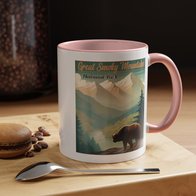 11 oz pink ceramic mug featuring an illustration of a bear in Great Smoky Mountains National Park with mountains and trees in the background.