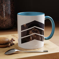 11 oz ceramic mug with light blue handle featuring a mountain design with three chevrons, representing Arches National Park.