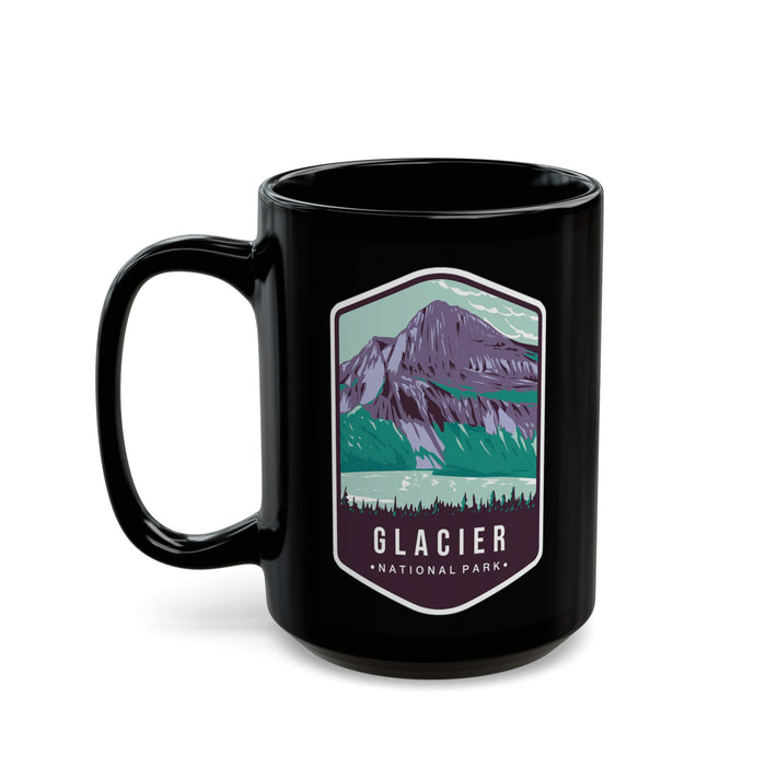 Ceramic mug featuring an illustration of Glacier National Park with mountains and forests.