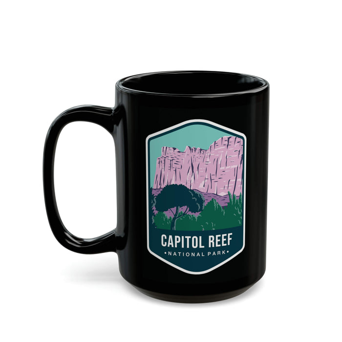 Ceramic mug featuring a scenic design with rock formations and a tree, representing Capitol Reef National Park.