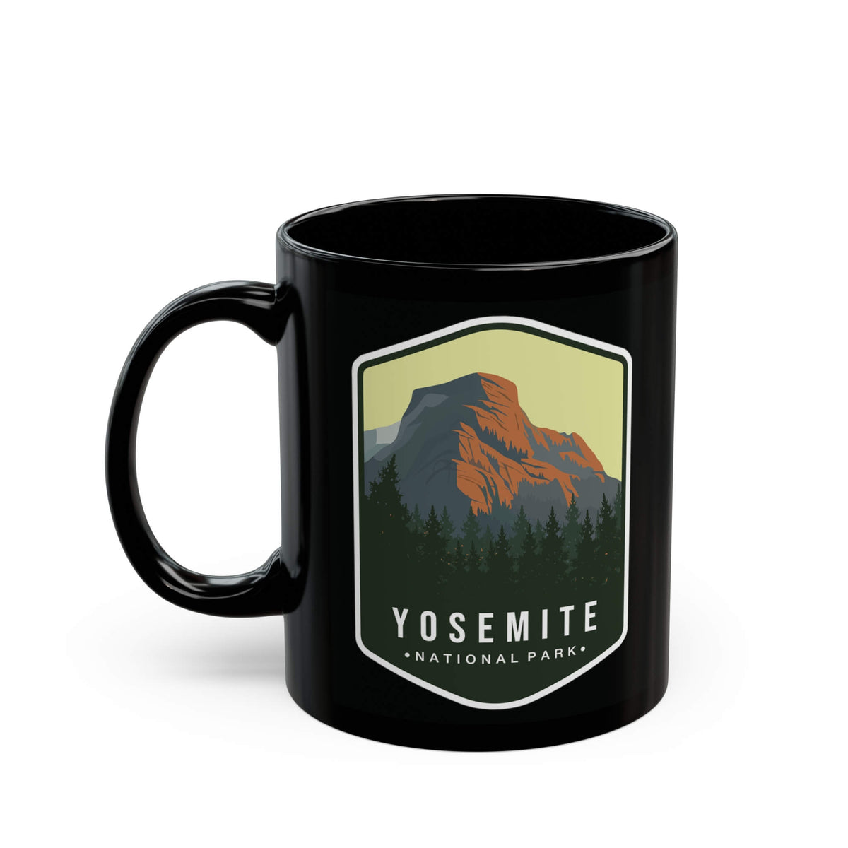 Black ceramic mug featuring a design of Yosemite National Park with a mountain and forest.